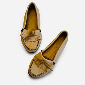 Minnetonka Tan Moccasins with Fringe Detailing